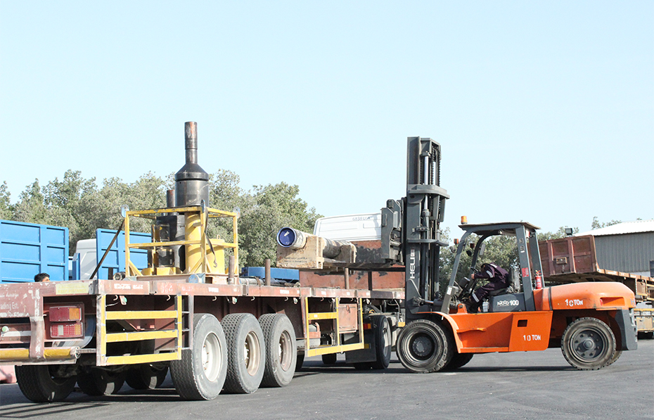 Industrial transportation: Forklift moving cargo onto a truck